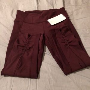 Lululemon yogo pants in wine. Size 12 NWT